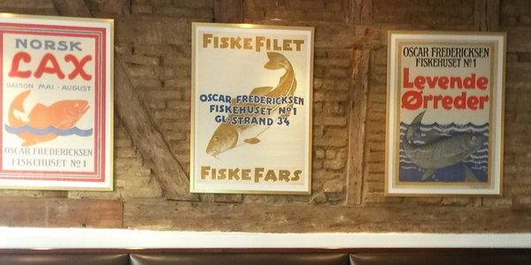 Vintage posters used in restaurant and hotel decor